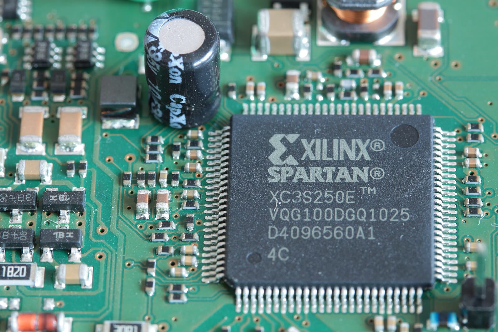 Close-up of a programmable logic chip on a printed circuit board